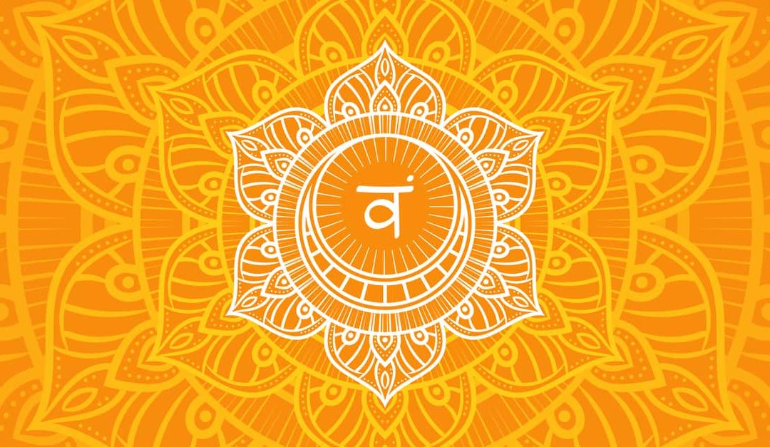 svadhishthana, sacral chakra symbol, orange mandala background