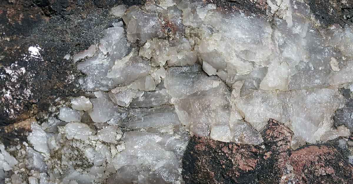 Quartz rock embedded in oceanside rocks