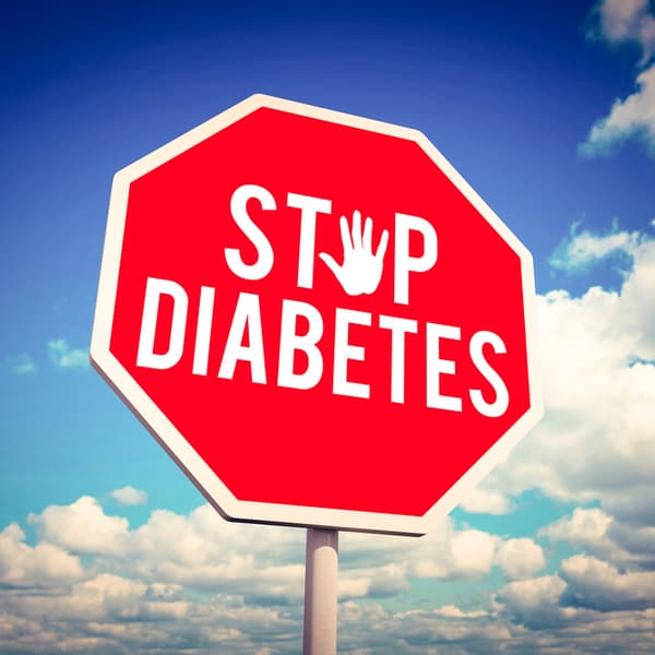 A stop diabetes sign against a scenic view of a beautiful blue sky